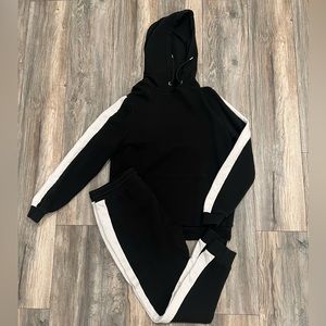 ASOS DESIGN Tracksuit set with side stripe in black
